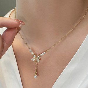 GOLIC Bow Pearl Necklace
